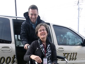 Jeff Tribe/Tillsonburg News
Stonebridge Community Services Special Services Coordinator Max Adam illustrates the operation of the MSC’s wheelchair (and walker and mobility scooter) accessible van with the assistance of volunteer model Wendy Woodhouse. Those seeking more information as either a client or volunteer driver, are invited to call 519-842-9008 extension 357 or 519-842-9000.