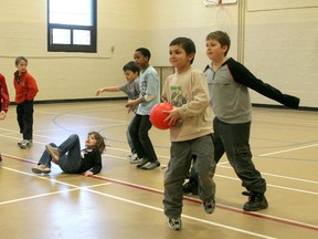 A group of day campers play a spirited game of dodge ball during a March Break day camp. Some of their activities included games, sports, crafts and swimming.