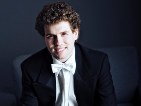 Evan Mitchell will replace Glen Fast as the musical director and conductor of the Kingston Symphony.