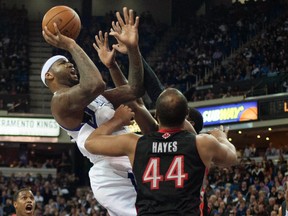 Chuck Hayes and the Raptors will have a tough time containing Kings centre DeMarcus Cousins at the ACC on Friday night. (USA TODAY/photo)