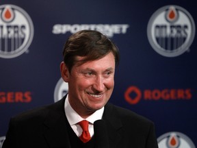 Wayne Gretzky speaks to the media during a press conference during the Edmonton Oilers game against the New York Islanders at Rexall Place in Edmonton Alta., on Thursday March 6,  2014. David Bloom/Edmonton Sun/QMI Agency