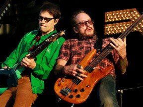 Weezer's Rrivers Cuomo (left) and Scott Shriner play during their set at Sonic Boom 2013 held at Edmonton Northlands on Sunday, Sept. 1, 2013. (QMI Agency)