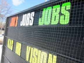 A sign advertising jobs is seen here on College Street East in Belleville, ON., Feb. 11, 2014. (EMILY MOUNTNEY/QMI AGENCY)