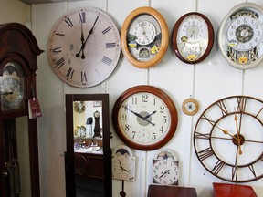 Terry and Liz Holgate have plenty of clocks to spring forward one hour at their Mineral Road business, TimeZone Jewellers, in Belleville, Ont. Friday, March 7, 2014. - JEROME LESSARD/The Intelligencer/QMI Agency