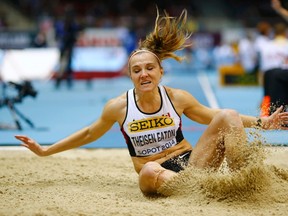 Canada's Brianne Theisen-Eaton competes in the long jump event during the women's pentathlon at the world indoor athletics championships at the ERGO Arena in Sopot March 7, 2014. (REUTERS/Kai Pfaffenbach)