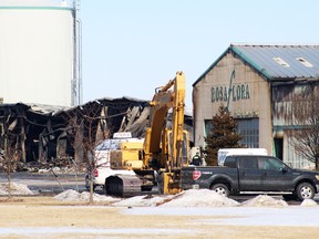 The Office of the Fire Marshal was on scene Friday investigating the multimillion-dollar fire that tore through the Rose Flora greenhouse in Dunnville Thursday morning. (MARYANNE FIRTH/Tribune Staff)