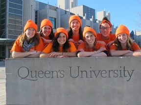 From left, Julia Dutaud, Gemma McEachern, Jacquie Safieh, Amy Booth, Dana Fallis, Brittany Lee and Kelsey Ross get used to the chilly weather.  They will be camping out on the corner of University and Union for five days to raise awareness and funds for youth homelessness in Kingston.
Michelle Ferguson/For the Whig-Standard