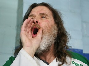Gino Donato/The Sudbury Star
Sudbury Wolves superfan Bryan Connors howls as the players take to the ice for the second period of a recent game. Connors' distinctive howl can be heard through the games he attends.