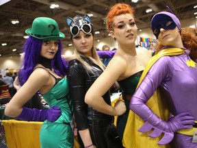 The Moffat girls dressed as their favourite Batman characters on March 7, 2014. Tamara is the Riddler, Natasha as Catwoman , Tatiana as Poison Ivy and Melissa as the original BatGirl. ComiCon runs all weekend at the Metro Toronto Convention Centre south building.  (Jack Boland/Toronto Sun)