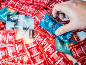 Condoms on display at a men's health centre. Ottawa area experts reacted strongly Friday to the Supreme Court ruling that poking holes in a condom to get a woman pregnant is a form of sex assault.
Photo By CARMINE MARINELLI/QMI AGENCY