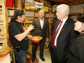 JOHN LAPPA/THE SUDBURY STAR 
Perry McLeod-Shabogesic, director of traditional programming and community initiatives at the Shkagamik-Kwe Health Centre, gives a tour of the traditional medicine room at the centre for Bruce Jago, of Laurentian University, former politician Bob Rae, second right, and Angela Recollet, executive director of the health centre, on Thursday.