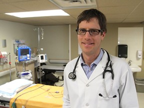 Dr. Chris Booth, in the chemotherapy unit at Kingston General Hospital, is the lead investigator of a study that is investigating whether increased physical activity can improve a colon cancer patient's survival rate. (Michael Lea/The Whig-Standard)