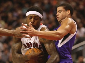 Raptors’ John Salmons (left) cuts in on the Kings’ Ray McCallum during Friday night’s game at the Air Canada Centre. (JACK BOLAND/TORONTO SUN)