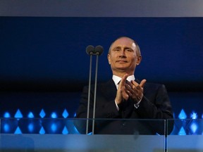 Russia's President Vladimir Putin attends the opening ceremony of the 2014 Paralympic Winter Games in Sochi, March 7, 2014.        (REUTERS/Alexander Demianchuk)