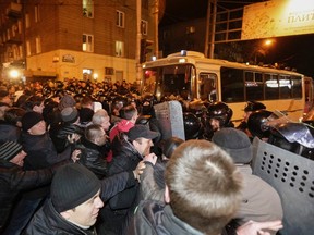 Pro-Russian demonstrators clash with riot police during a protest rally in Donetsk March 6, 2014. (REUTERS/Konstantin Chernichkin)