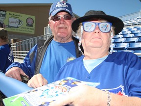 Phyllis Reid, 69, and her husband Richard, 71, at Florida Auto Exchange Stadium in Dunedin, Fla. watching the Toronto Blue Jays play on March 5, 2014. This is a tradition they have held for the last 30 years. (Veronica Henri/Toronto Sun)