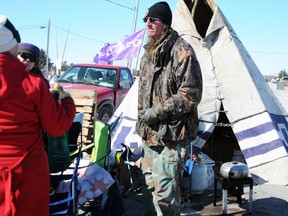 Members of the Occupy Our Hearts Belleville group visit with native protesters on Shannonville Road in Tyendinaga Township.

Janet Richards/QMI AGENCY
