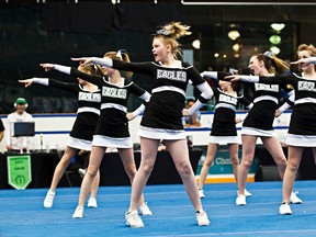 The Steele Heights Eagles cheer team competes during the 2014 Alberta Cheerleading Championships at West Edmonton Mall's Ice Palace in Edmonton, Alta., on Saturday, March 8, 2014. Codie McLachlan/Edmonton Sun/QMI Agency