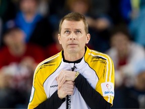Manitoba skip Jeff Stoughton watches a replay after missing a shot in seventh end against team Quebec during the Page Playoff 3-4 game at the 2014 Tim Hortons Brier curling championships in Kamloops, B.C. March 8, 2014. (BEN NELMS/Reuters)