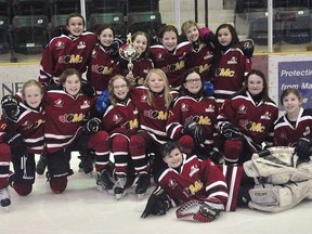 The Portage atom female team celebrates their consolation victory at the Female Rural A/B Provincials, held in Portage la Prairie Mar. 7-9. (Kevin Hirschfield/THE GRAPHIC/QMI AGENCY)