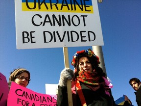 Maria Arseniuk protests against the Russian incursion into Crimea on March 9, 2014 in Ottawa.  Demonstrators want Western countries to protect Ukraine from Russian President Vladimir Putin's attempt to annex the Ukrainian peninsula. 
(TONY SPEARS/QMI Agency)