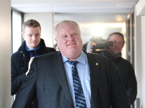 Mayor Rob Ford is pictured in a social housing building on March 5. (Stan Behal, Toronto Sun)