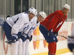 Joffrey Lupul (left) and Peter Holland return to a familiar haunt when the Leafs invade the Honda Center in Anaheim on Monday night. (Michael Peake, Toronto Sun)