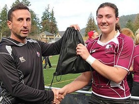 McMaster University women's rugby team captain Cindy Nelles receives here MVP award at the 2014 National University 7's championships, Sunday in Langford, B.C. (RUGBY CANADA)