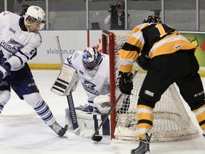 Mississauga Steelheads goaltender Lucas Peressini makes the save on a shot from Kingston Frontenacs' Ryan Kujawinski during OHL action at the Rogers K-Rock Centre on Sunday. (Julia McKay/The Whig-Standard)