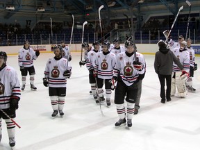 Sarnia Legionnaires players salute their fans before leaving the ice after falling 4-1 to the London Nationals in game 7 of their GOJHL Western Conference Quarterfinal on Sunday night. The loss marks the end of the Legionnaires' 2013-2014 season. SHAUN BISSON/THE OBSERVER/QMI AGENCY