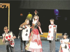 Riley Paige as the Queen of Hearts with her Royal Cardsman, from left, Bryce Kirkham, Makayla Fox, Lawson Lowther, Jesse Navarathinam perform in the Theatre LYTE production of Alice in Wonderland Jr. on at the Palace Theatre from March 13-16. (Ross Davidson/Special to QMI Agency)