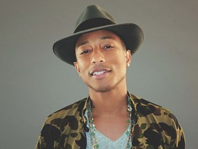 Pharrell Williams is happy and you know it on G I R L.