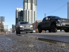 Vehicles drive on Macleod Tr., south of downtown, along the proposed route of a new bike lane in Calgary, Alta., on Sunday March 9, 2014.
Mike Drew/Calgary Sun/QMI Agency