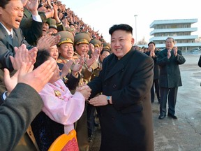 North Korean leader Kim Jong-un visits participants of a national agriculture competition in this undated photo released by North Korea's Korean Central News Agency (KCNA) in February 10, 2014. (REUTERS/KCNA/File)