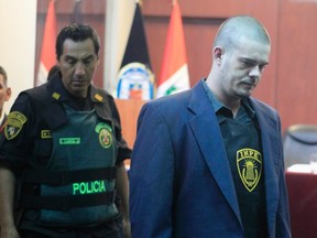 Dutch citizen Joran Van der Sloot enters the courtroom before his trial in Lima in this January 6, 2012 file photo. (REUTERS/Pilar Olivares)