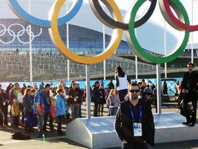 Mitchell native Andrew Wolfe, who works with the NHLPA, was at the Winter Olympics in Sochi, Russia from Feb. 9-20. Above, he stands in front of the Olympic rings and the Bolshoy Arena where the hockey games were played. SUBMITTED