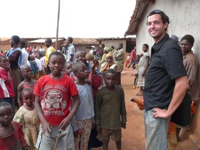 Michael Pietrzak visits with children at the Dzaleka Refugee Camp back in 2008. The Sarnia native recently co-founded LightSeed Energy, a business marrying his passions of international development and renewable energy. (Submitted photo)