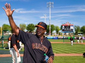 San Francisco Giants former outfielder Barry Bonds waves to the fans prior to the game against the Chicago Cubs at Scottsdale Stadium. (Mark J. Rebilas-USA TODAY Sports)