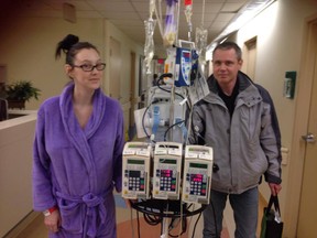 Double-lung transplant recipient Kayla Mavretic takes a walk in Toronto General Hospital. The 24-year-old Sarnia woman has surprised family and friends by all the strides she has made less than two weeks after her recent operation. SUBMITTED PHOTO