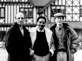 Rubin Carter with Toronto activists Sam Chaiton, left, and Terry Swinton, right, in 1992. (QMI Files)