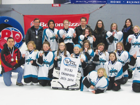 The Portage Thunder U12 team poses with gold medals after winning the Winnipeg Ringette League's U12-B2 title over the weekend. (Submitted photo)