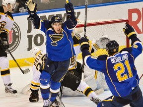 Blues right wing T.J. Oshie (74) celebrates scoring the game-winning goal against the Bruins in overtime in St. Louis on Feb. 6, 2014. (Jasen Vinlove/USA TODAY Sports/Files)
