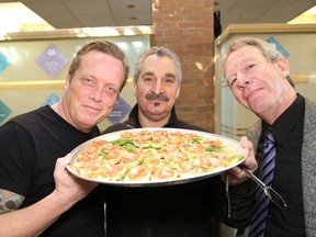 Celebrity chef David Adjey, left, Wayne Tonelli, president of Miners for Cancer, and former local chef Stuart Raymond were on hand at the Northeast Cancer Centre in Sudbury to promote Dining for a Cure on Thursday, March 6, 2014. The event, which is a fundraiser for the cancer centre, will have Chef Adjey prepare a "live" culinary feast for guests with the assistance of Raymond and other local chefs at the Steelworkers Hall on April 30.  Several “Sud‐lebrity” servers will serve the meals. The event is being presented by Miners for Cancer and the Northern Cancer Foundation. Tickets are $125 each and can be purchased at the Northern Cancer Foundation, or online at www.minersforcancer.ca. JOHN LAPPA/THE SUDBURY STAR/QMI AGENCY