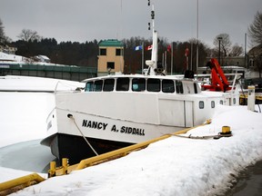 A fishing tug rests at dock in Port Stanley recently surrounded by water, snow and ice. It could be early April before the tugs are back in business this year.

Ben Forrest/Times-Journal