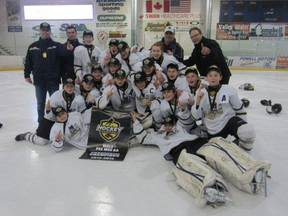 The Portage peewee AA team celebrates its gold medal at the Rural Peewee AA provincials in Swan River over the weekend (Submitted photo)