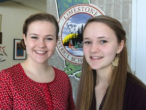 Michelle Sempowski, left, and Marnie McCormac, student trustees for the Limestone District Board of Education, are involved in a board-wide fundraising effort to raise $10,000 to build a school in Africa.
Michael Lea The Whig-Standard