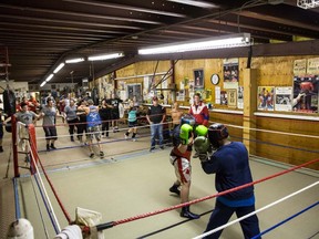 The Kingston Youth Boxing Club is a busy place under the waqtchful eyes of coaches Colin and Ken MacPhail.
Photo by Edward O'Brien