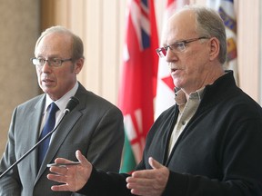City of Winnipeg Mayor Sam Katz (left) and Emergency Preparedness Coordinator Randy Hull speak at a press conference on frozen water lines Monday, March 10, 2014. Hull said it's important for at-risk residents to continue to take precautionary measures, and thawing will continue into June. (Brian Donogh/Winnipeg Sun)