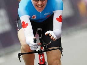 Canada's Clara Hughes crosses the finish line in the women's cycling individual time trial at the London 2012 Olympic Games, August 1, 2012. 
REUTERS/Mark Blinch