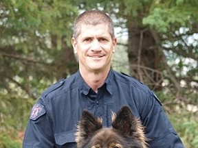 Cpl. Gord Rutherford and police service dog Clive. (Handout)